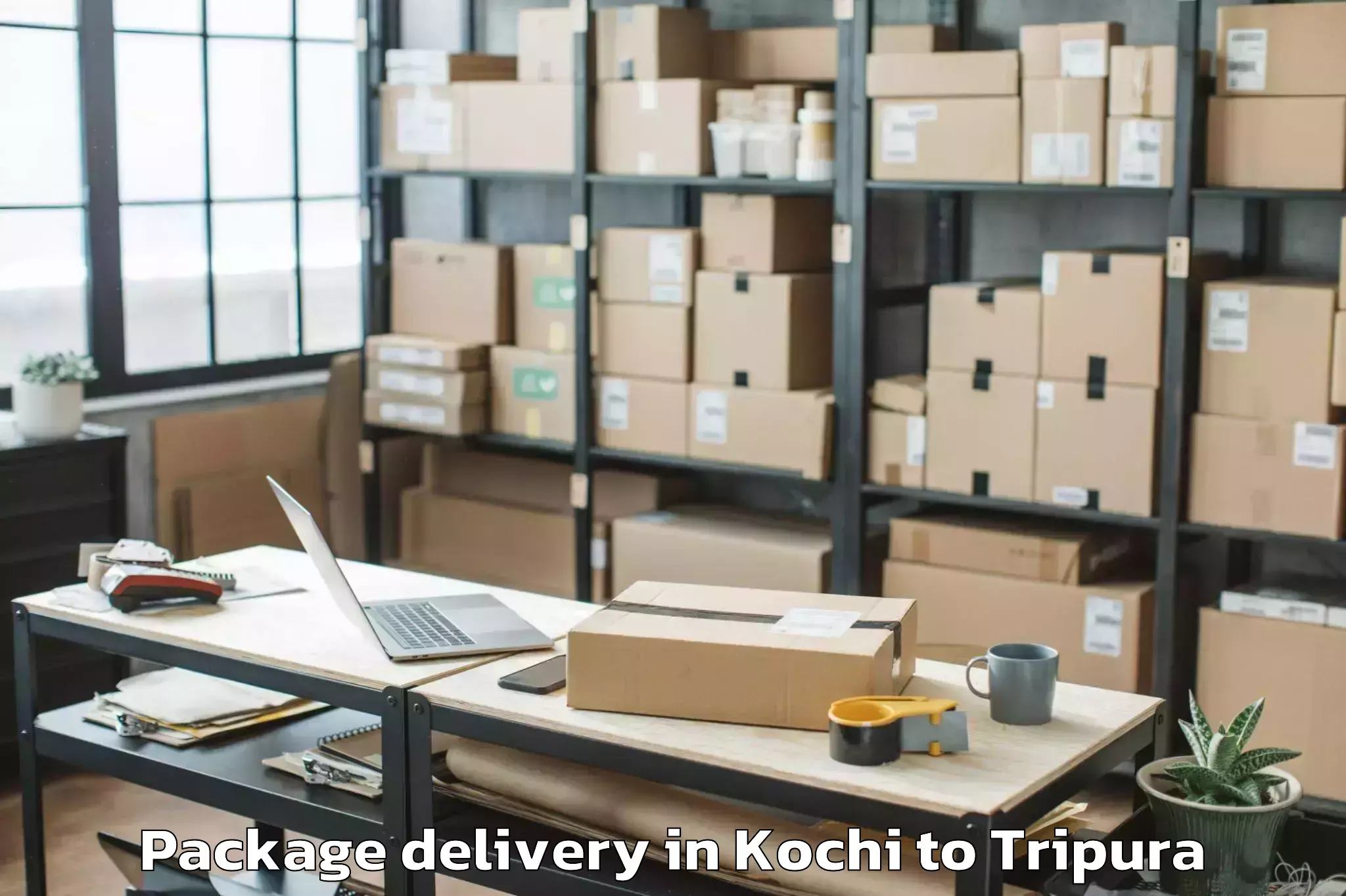 Kochi to Kamalpur Airport Ixq Package Delivery Booking